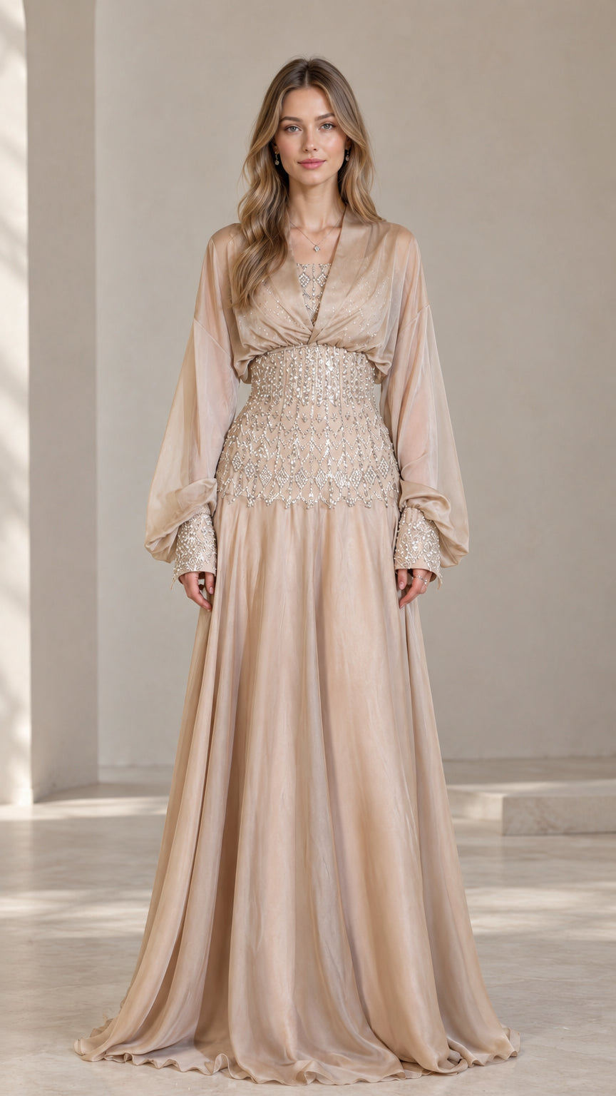 Front view of champagne long sleeve formal maxi dress with embellished waist