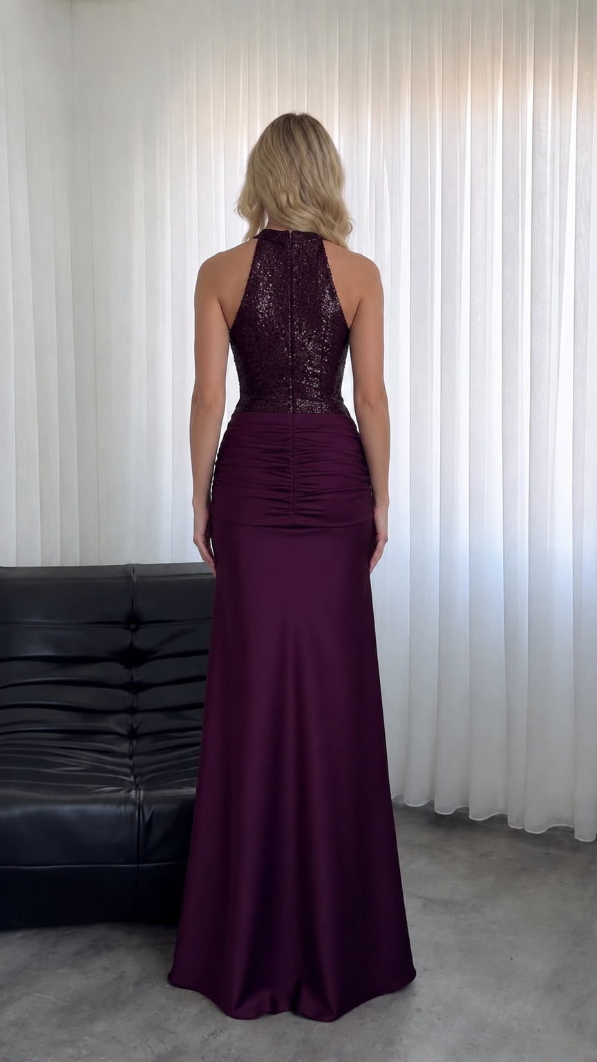 Back view of model wearing Burgundy high-back halter evening dress
