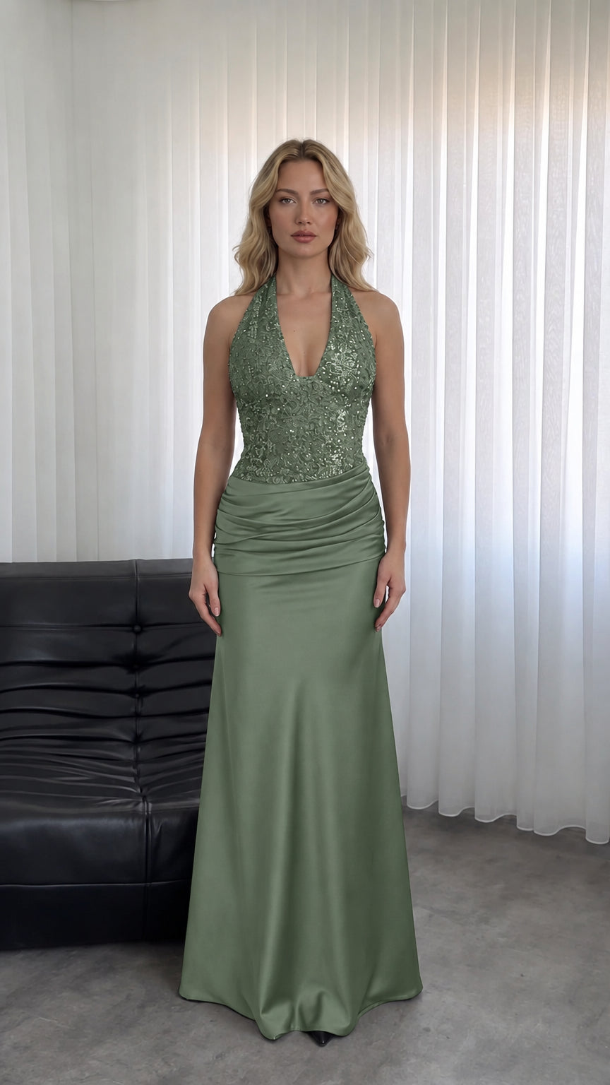 Model wearing Sage Green halter sequin bodice formal maxi gown